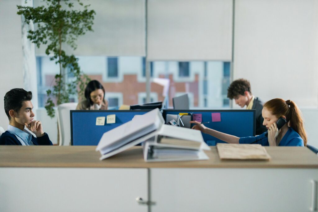 Professional organizing priorities and improving workplace productivity in a collaborative office environment.